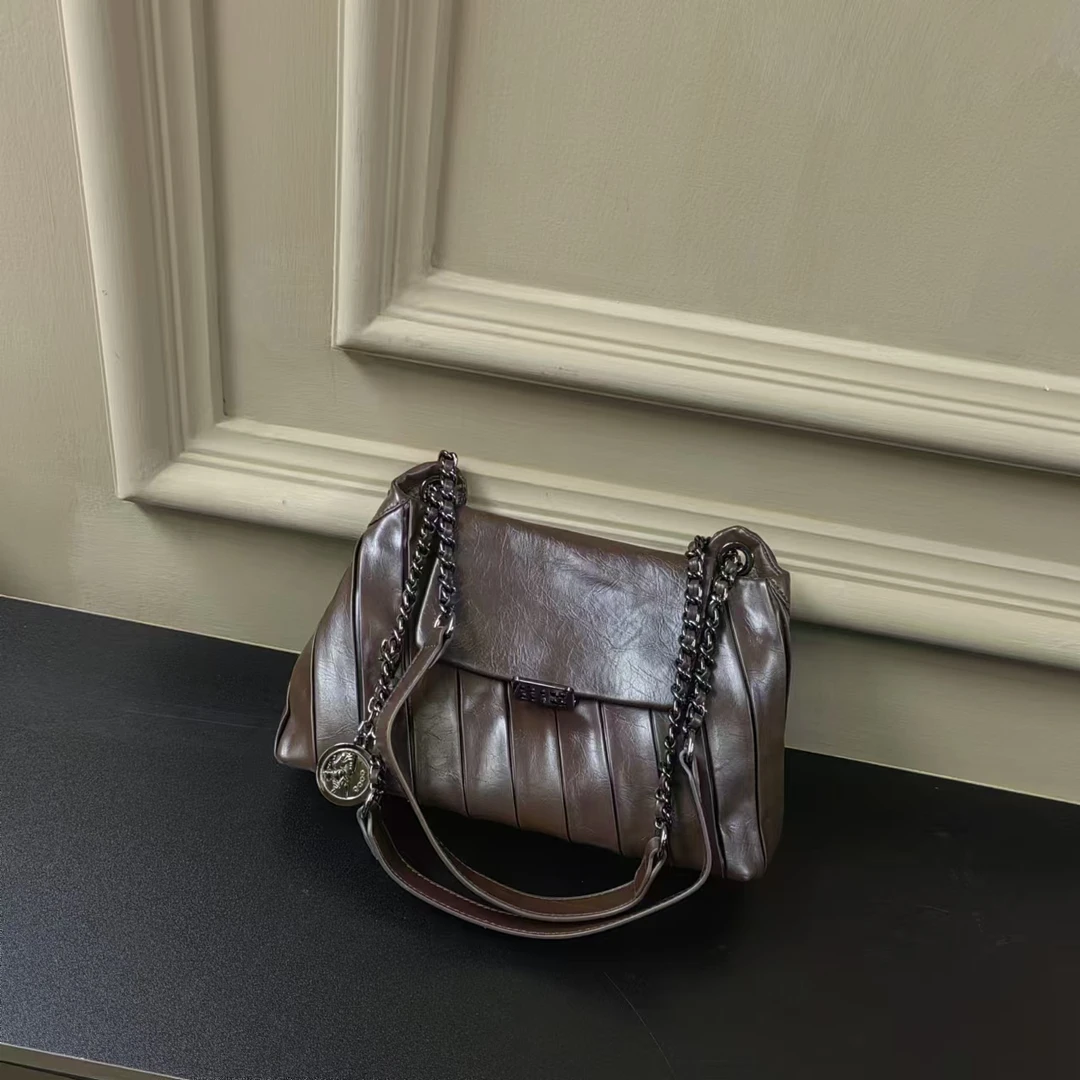 【芝麻集】ZT-D7035-塞诺咖RAIN.CUN简约腋下斜跨轻奢女包