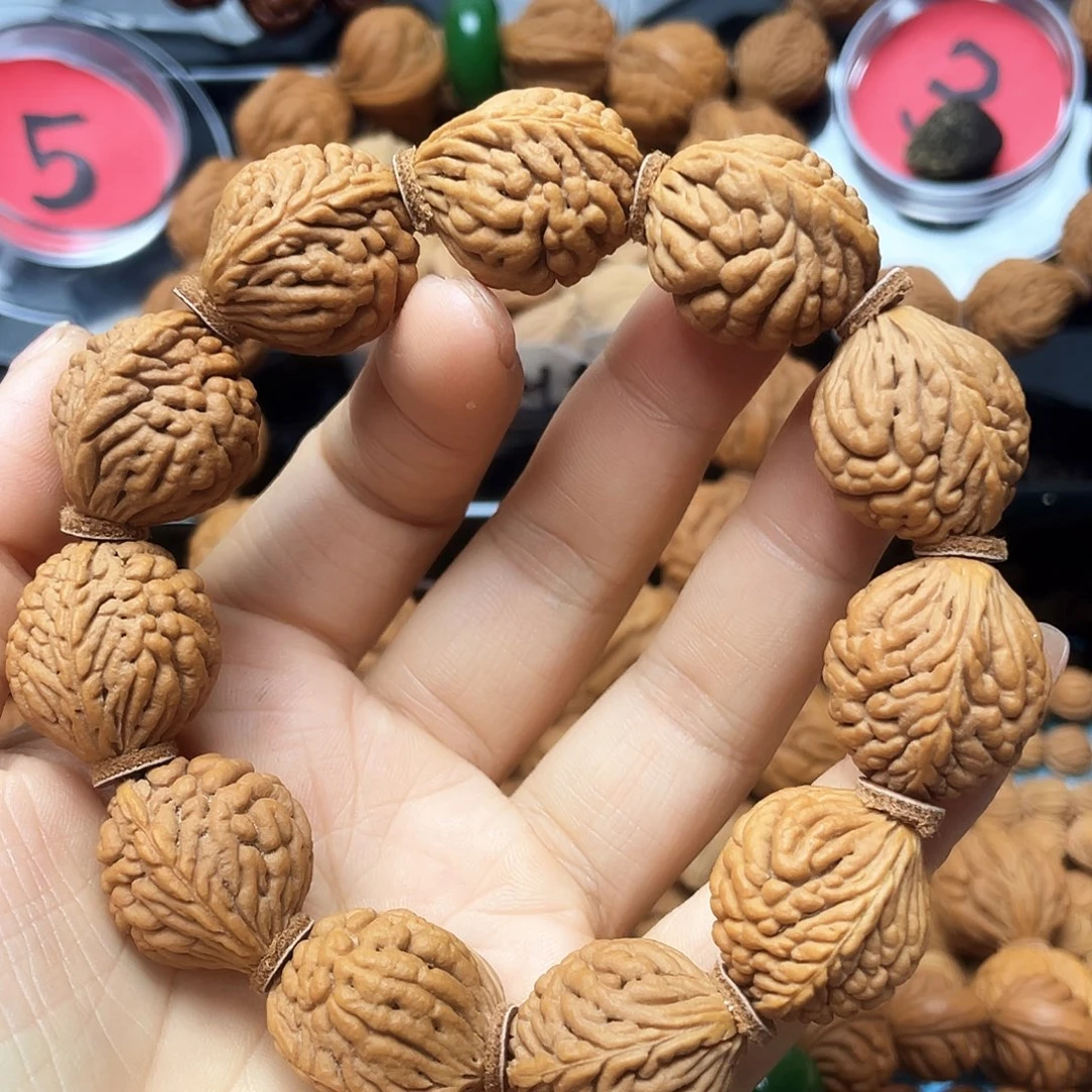 苏***成手串桃核桃枭手串20尺寸
