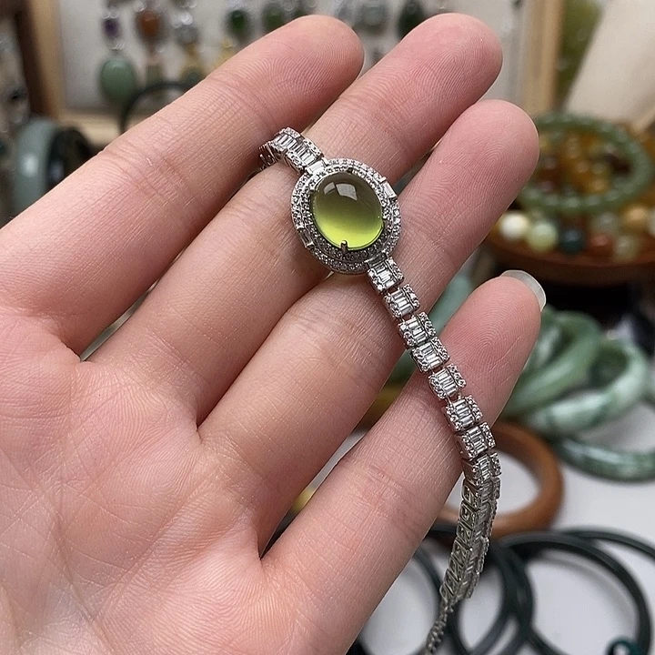 蛇纹石玉银S925镶嵌戒指L****糯