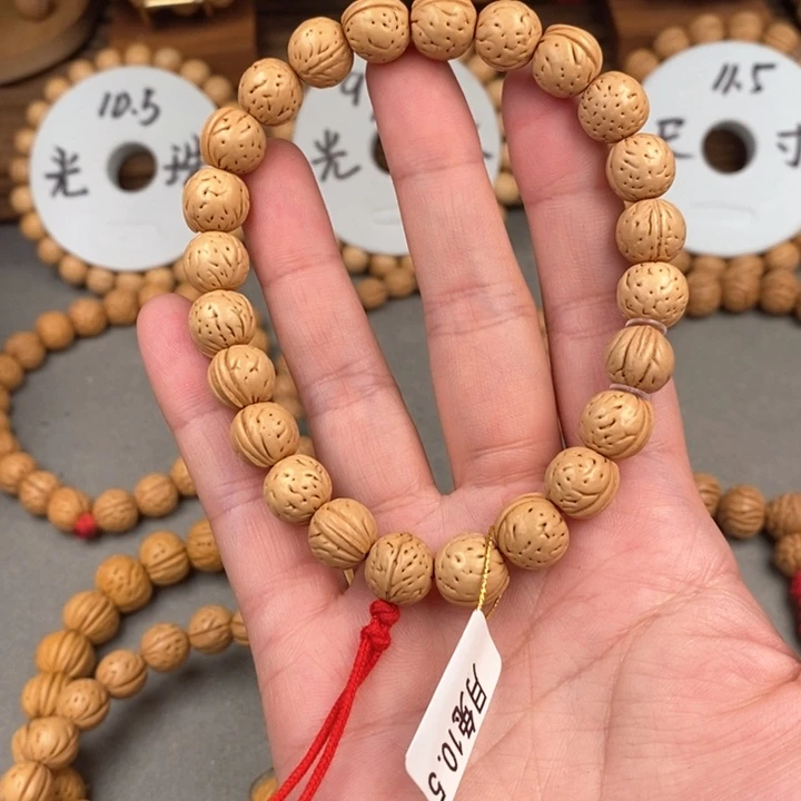 桃核手串水****浪月兔10.5抛光尺寸误差0.5之间