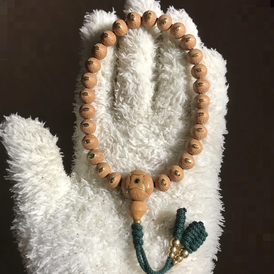 精品实心树王1.0-1.03cm小凤眼27颗手持 慈悲眼sss级