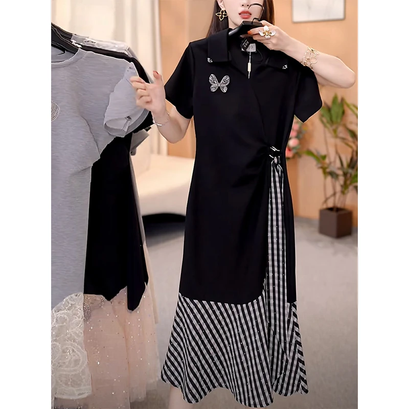 格子拼接连衣裙女2025夏季新款高级感蝴蝶小众减龄气质修身裙子潮