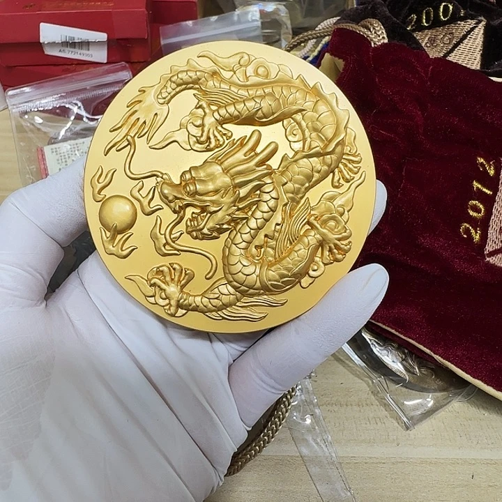 无***旅其他普通金属12年生肖龙投资担保有限公司纪念章