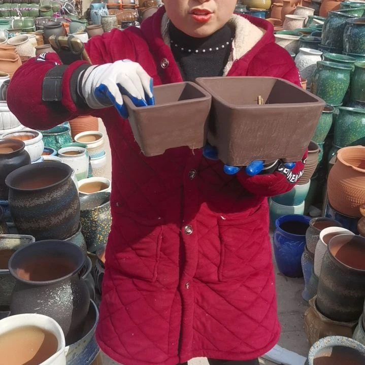 红陶瑕疵两个盆子。。