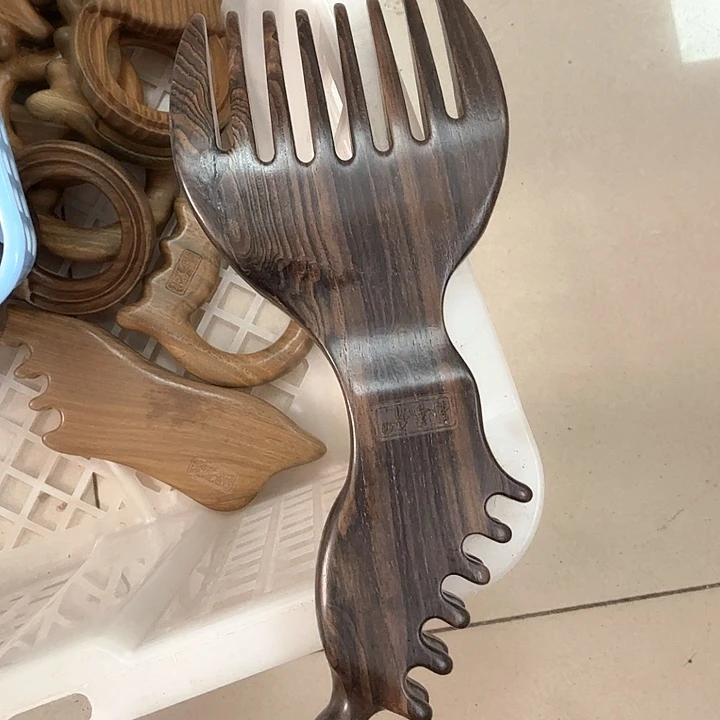 紫光檀凤凰梳子瑕疵