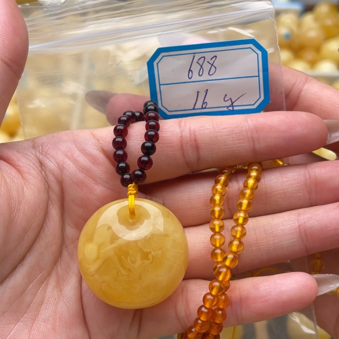 琥珀未镶嵌裸石蜜蜡吊坠笑