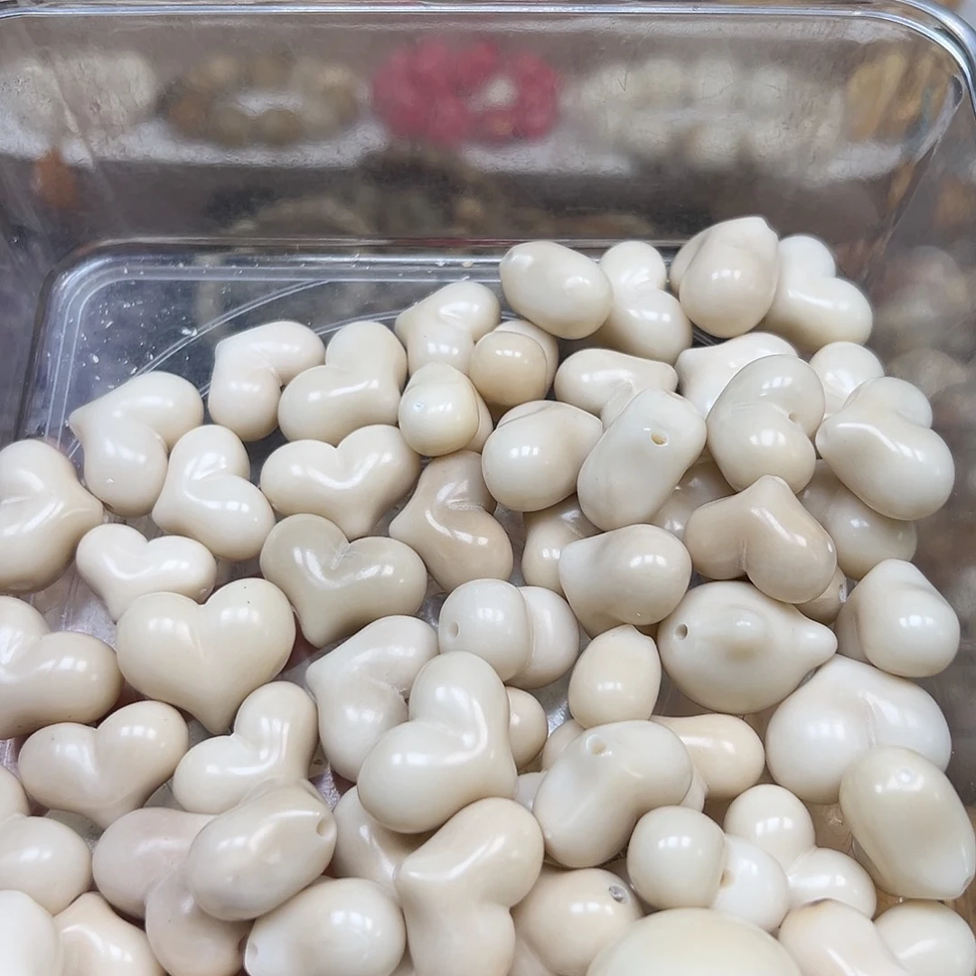 手串菩提根/象牙果瑕疵白爱心10颗有裂