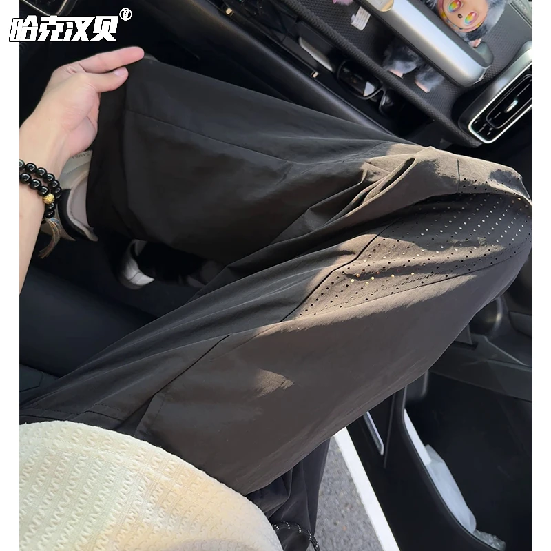 打孔透气速干裤男女同款夏季薄款弯刀休闲裤子宽松大码拼接直筒裤