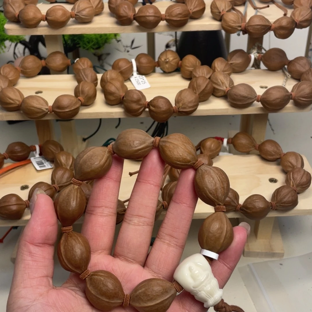 咸***咸橄榄核手串/手链20*27梅林铁核