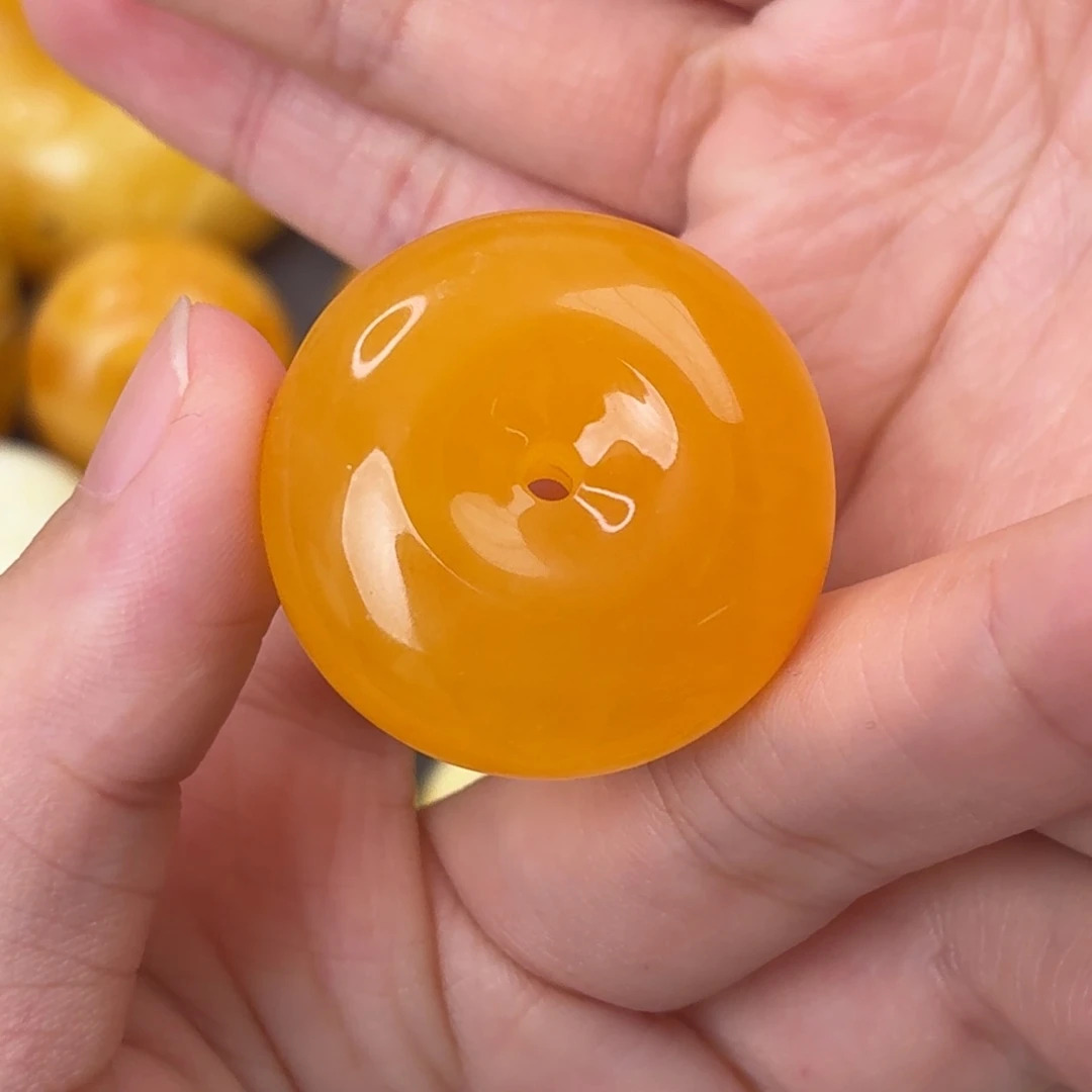 裸石琥珀未镶嵌橘红扣子