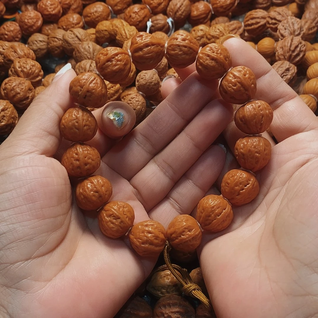 渲***粑文玩核桃手串磨盘