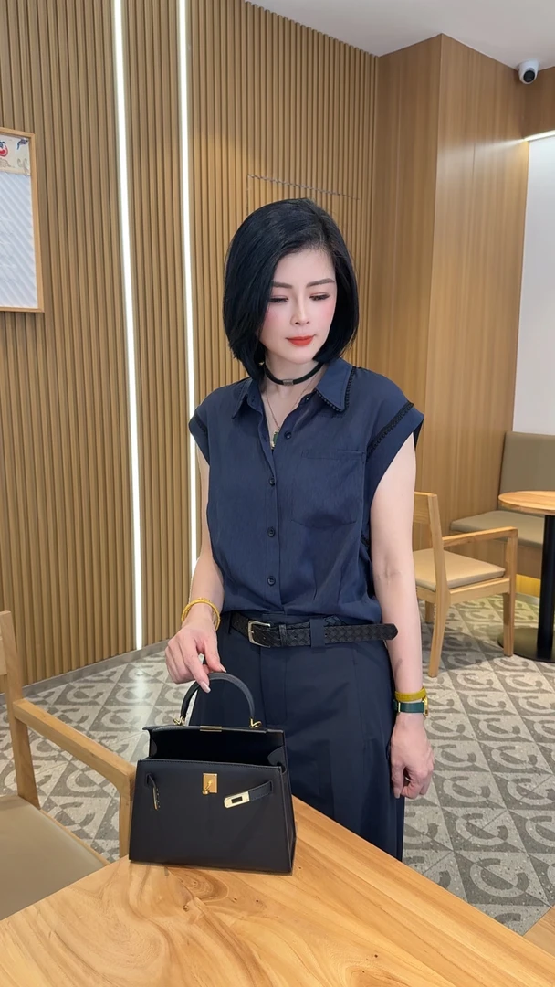 【娟子】时尚无袖拼蕾丝显瘦衬衫