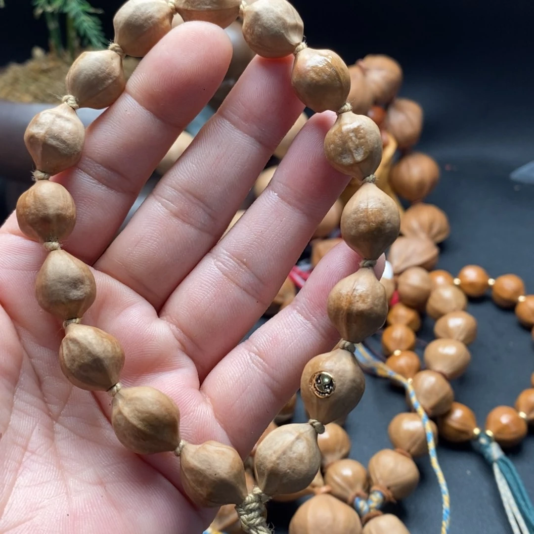 橄榄核吊坠戒****?橄榄核1.2