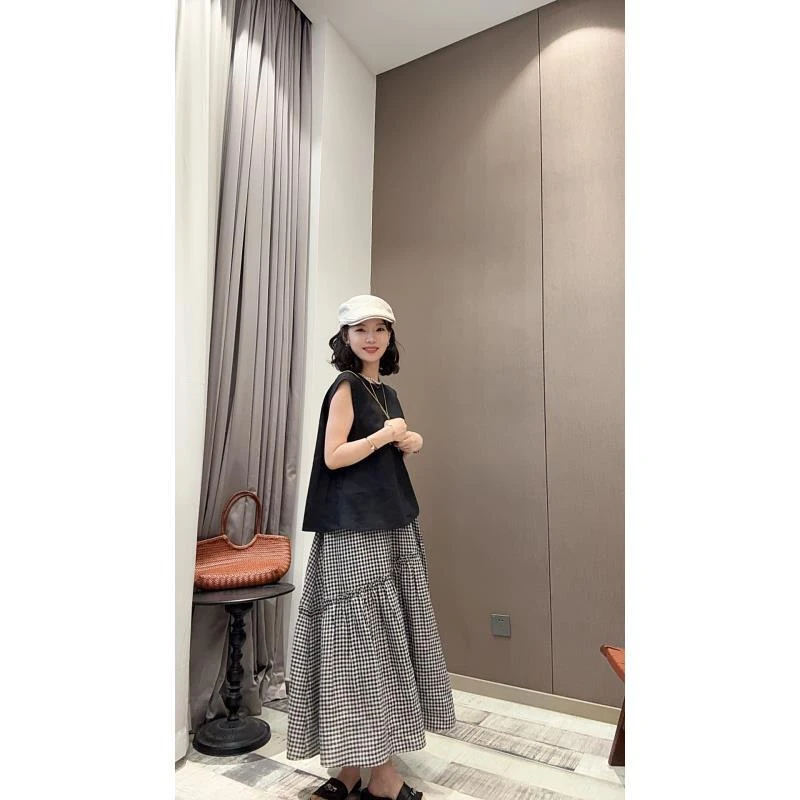 【618专属】松紧腰法式黑雨露格子不规则高腰A字半身裙女长款25199