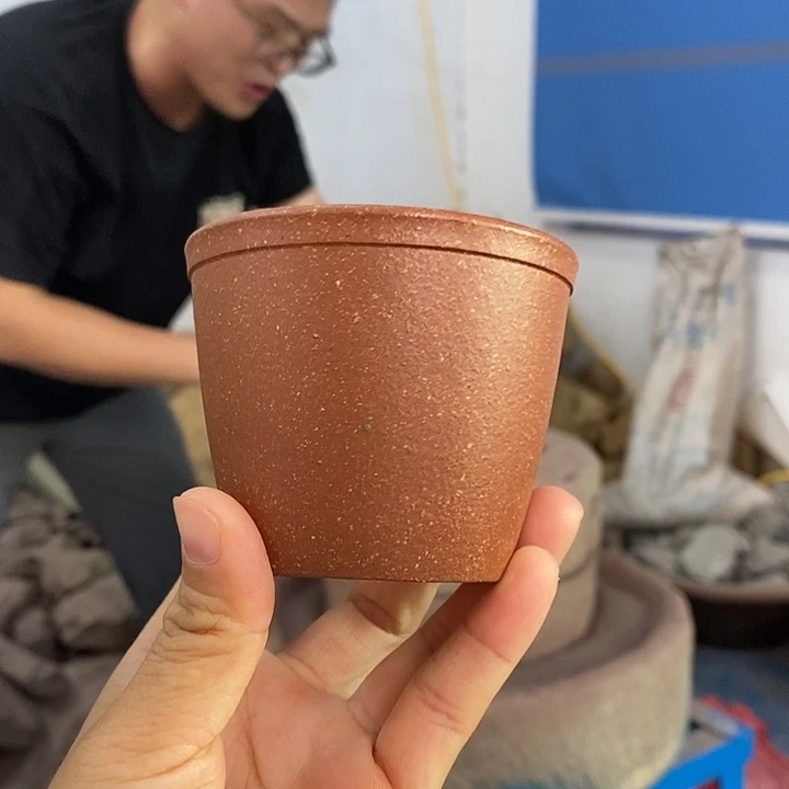 茶壶紫砂红降坡主人杯100左右的容量有铁质，油斑