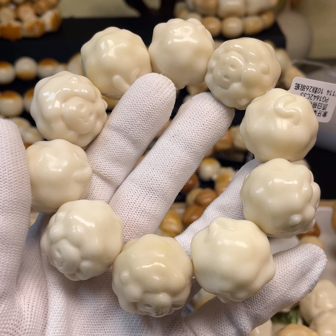 菩提根/象牙果手串126大羊头瑕疵