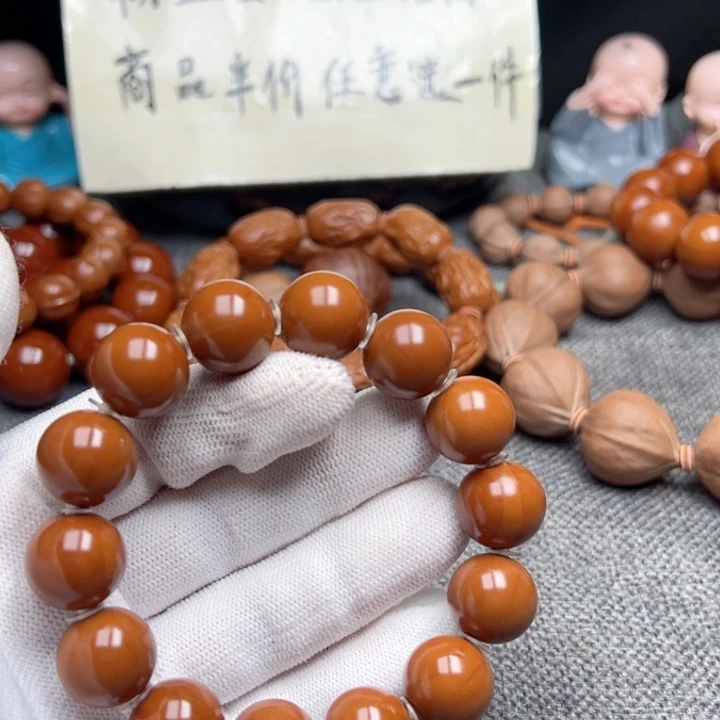 新***峰橄榄核手串1.5全品小孔