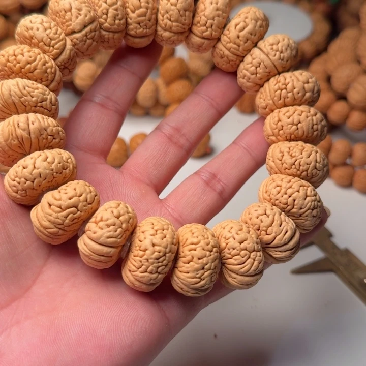 剃***姑吊坠桃核龙鳞王飞碟