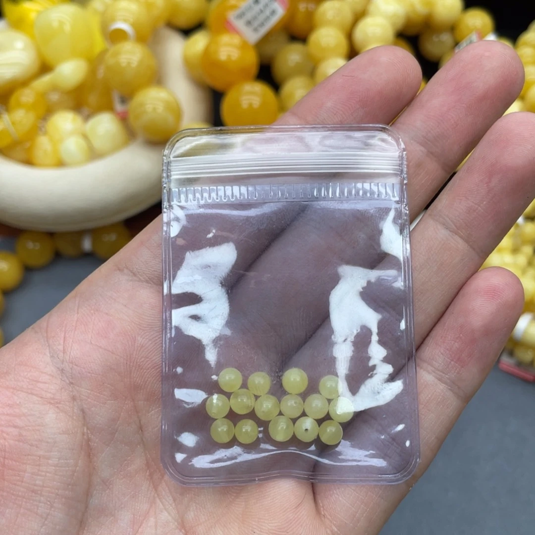 阿***巴未镶嵌蜜蜡裸石俄料圆珠单颗小米数