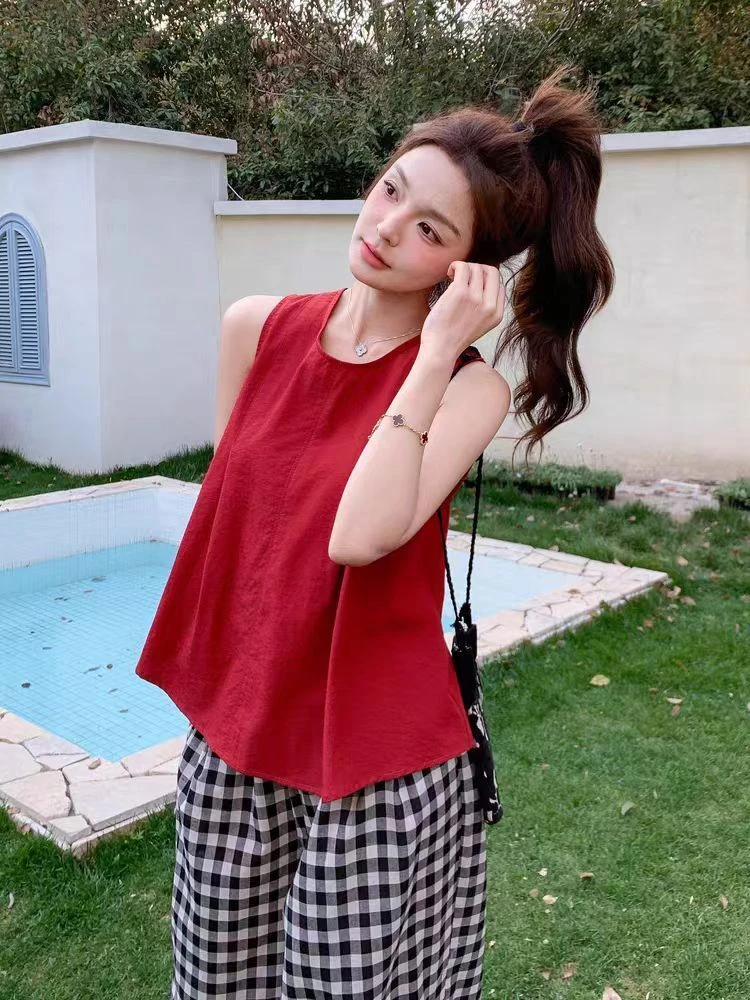 2025夏季吊带轻熟风可露丽风时尚短款慵懒风上衣纯色系带宽松休闲