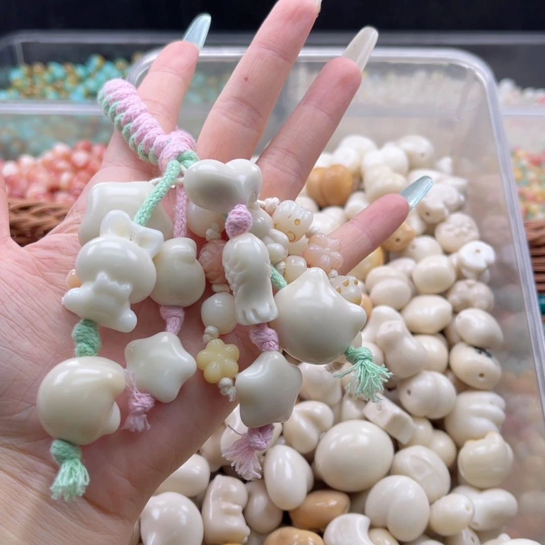 白玉菩提吊坠b瑕18-25mm/5颗象牙果