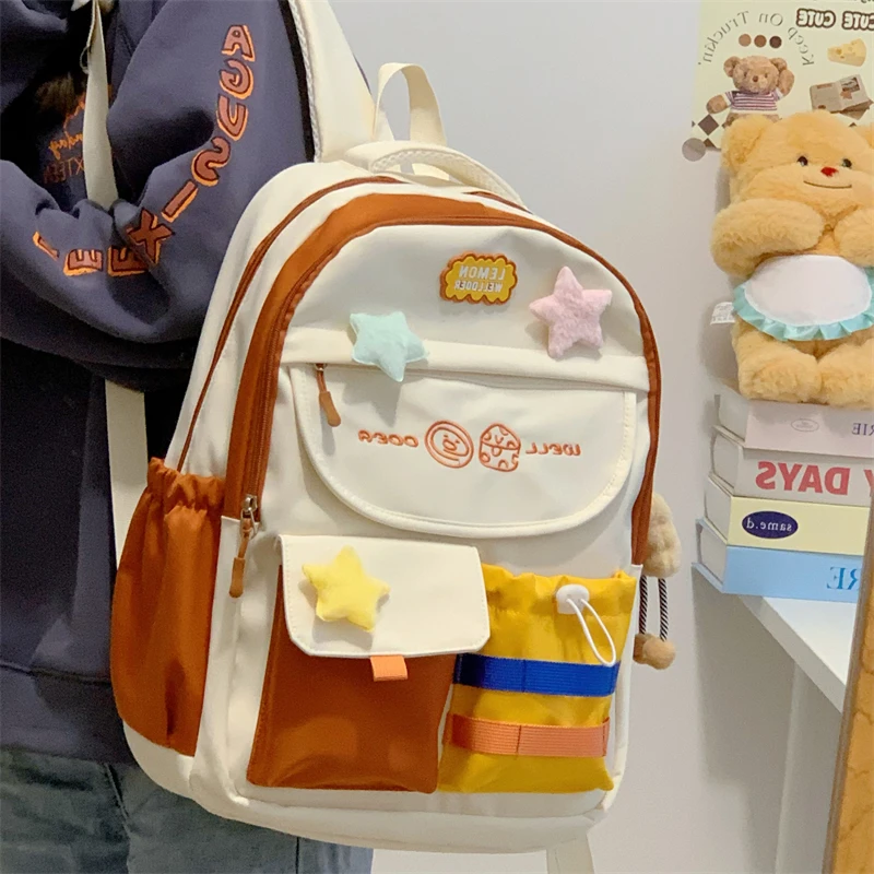 学生书包女生新款撞色双肩包大容量轻便护脊小学生初中生休闲背包
