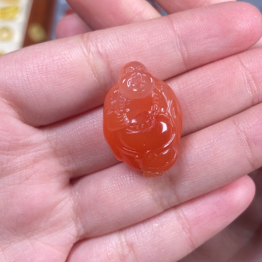 南红玛瑙佛公未镶嵌P****潘定制打牛鼻孔编金色线圈