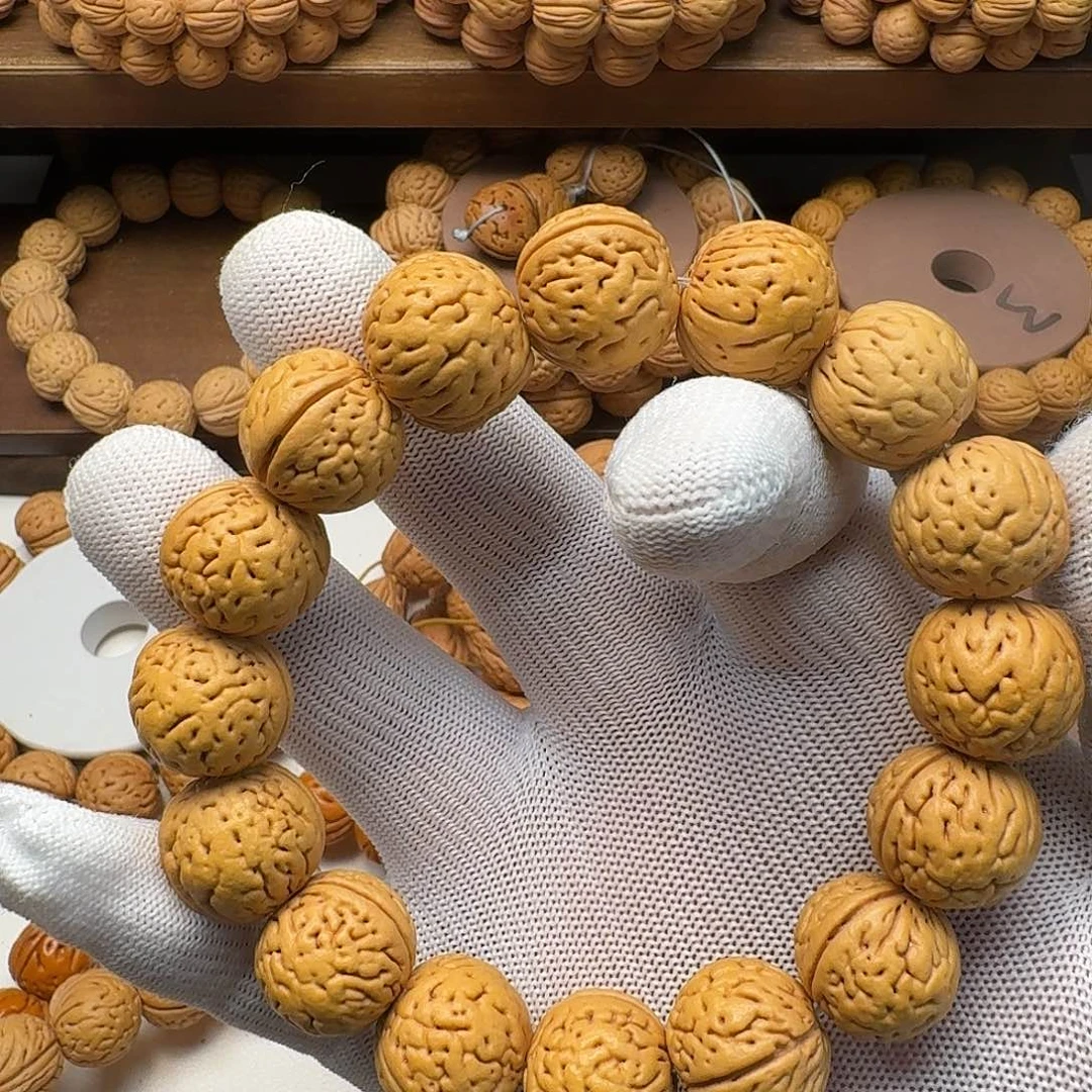 羡***鱼桃核手串盘锦奶油核肌肉