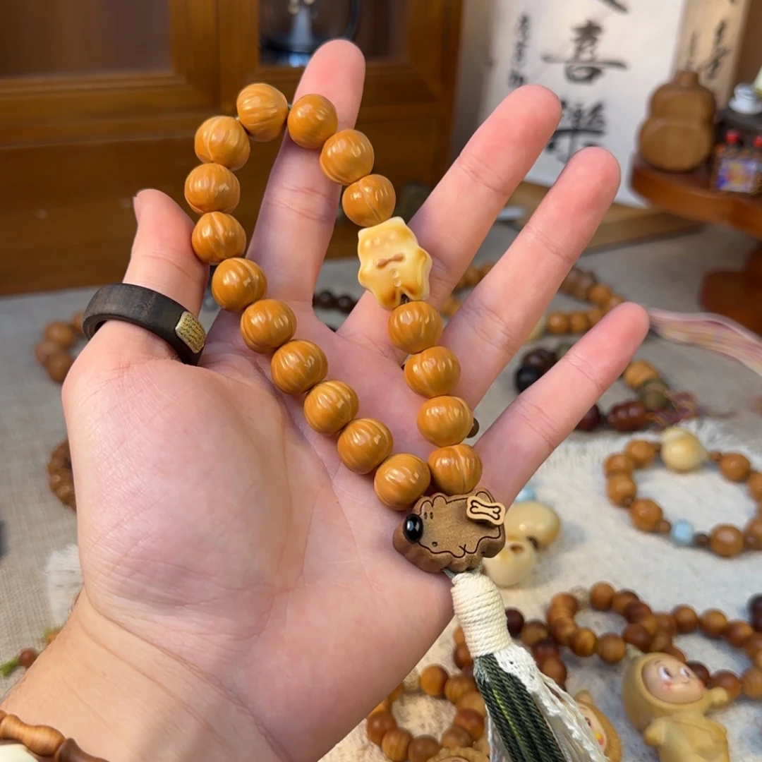 非洲檀香无事牌拉丝屁桃手持