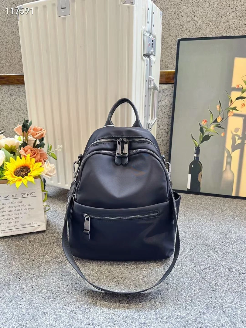 新美艺品牌通用百搭时尚潮流女士双肩背包