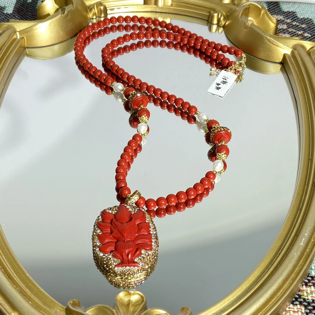 铜合金合成锆石项链 红色精雕九尾狐气质复古轻奢毛衣链 935