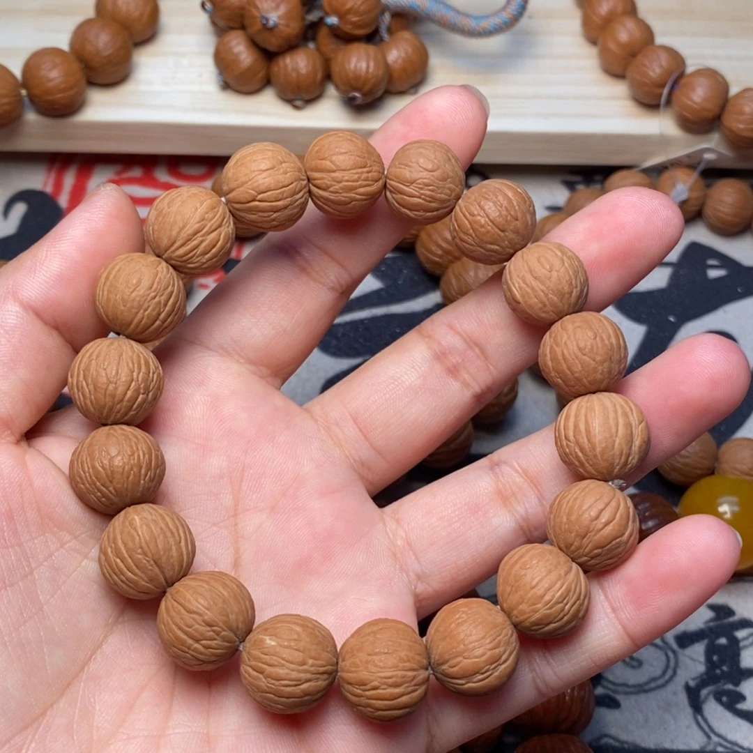 桃核吊坠凤羽原皮