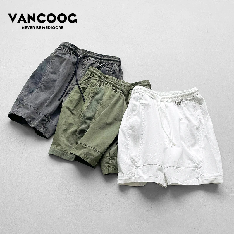 特价夏季宽松哈伦五分中裤多口袋休水洗工装裤百搭短裤男潮裤子