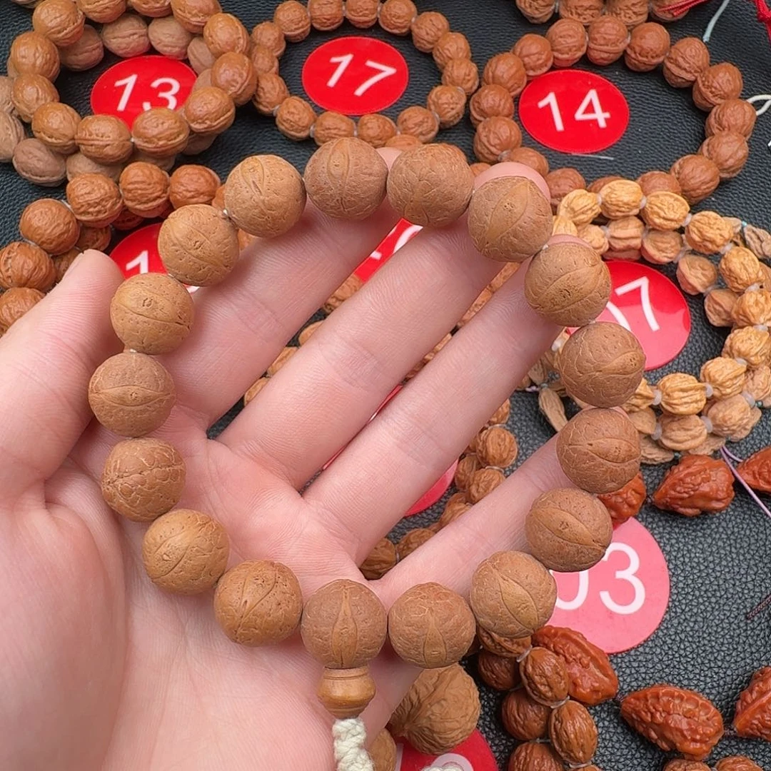 文玩核桃吊坠尼泊尔凤眼