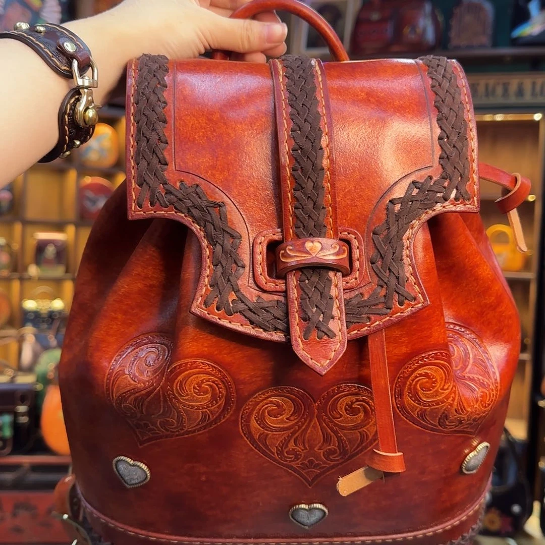 x***亮黄牛剖层皮革熊岛双肩