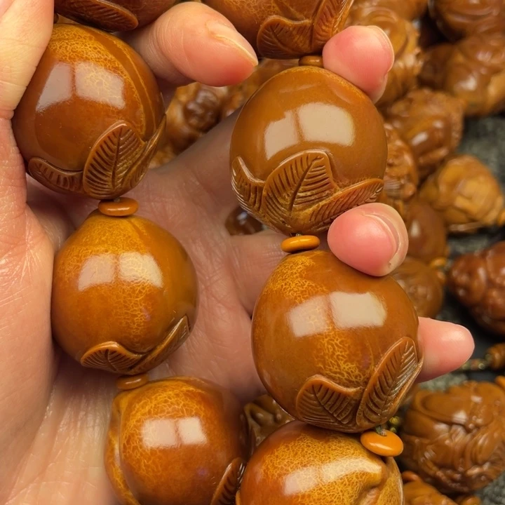 橄榄核吊坠一**恒橄榄核手持