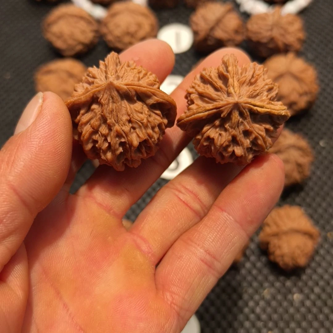 雍***宝文玩核桃吊坠小花丁三