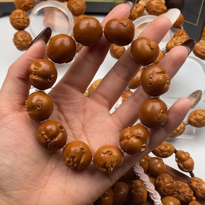 橄榄核吊坠百态人生