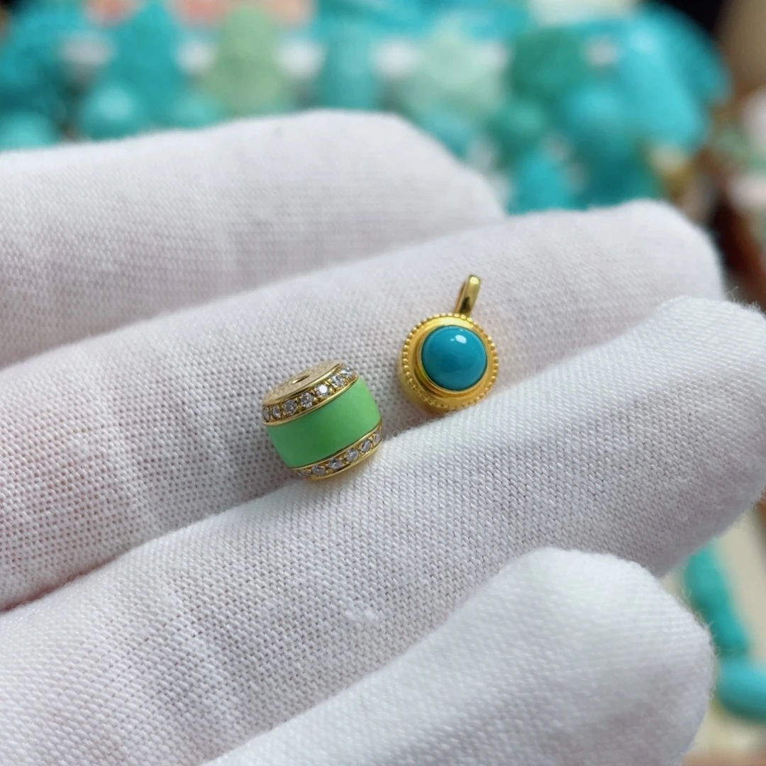 苹***娜绿松石18K金镶嵌珠宝奇石