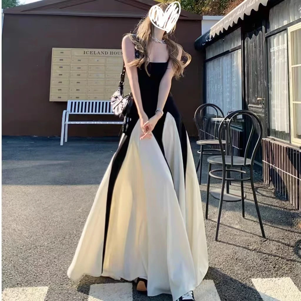 黑白拼接吊带连衣裙女2025新款春夏设计感小众长裙