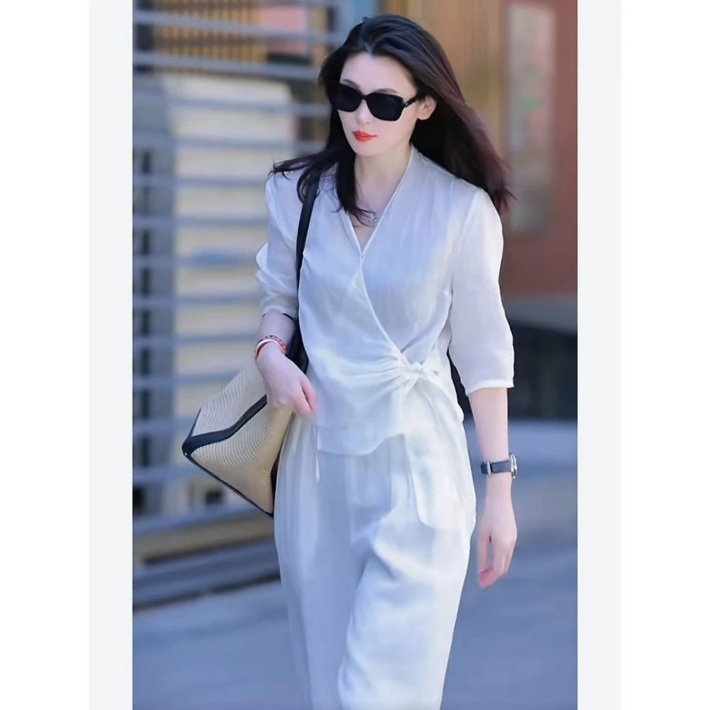 赫本风纯色V领上衣搭配宽松阔腿裤时尚度假套装女装白色收腰