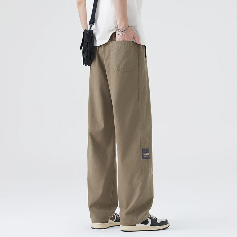 卡其色休闲裤男士夏季潮牌2025新款拼接宽松直筒冰丝凉感速干长裤