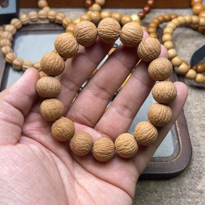 猴头核桃手串原皮凤羽16mm