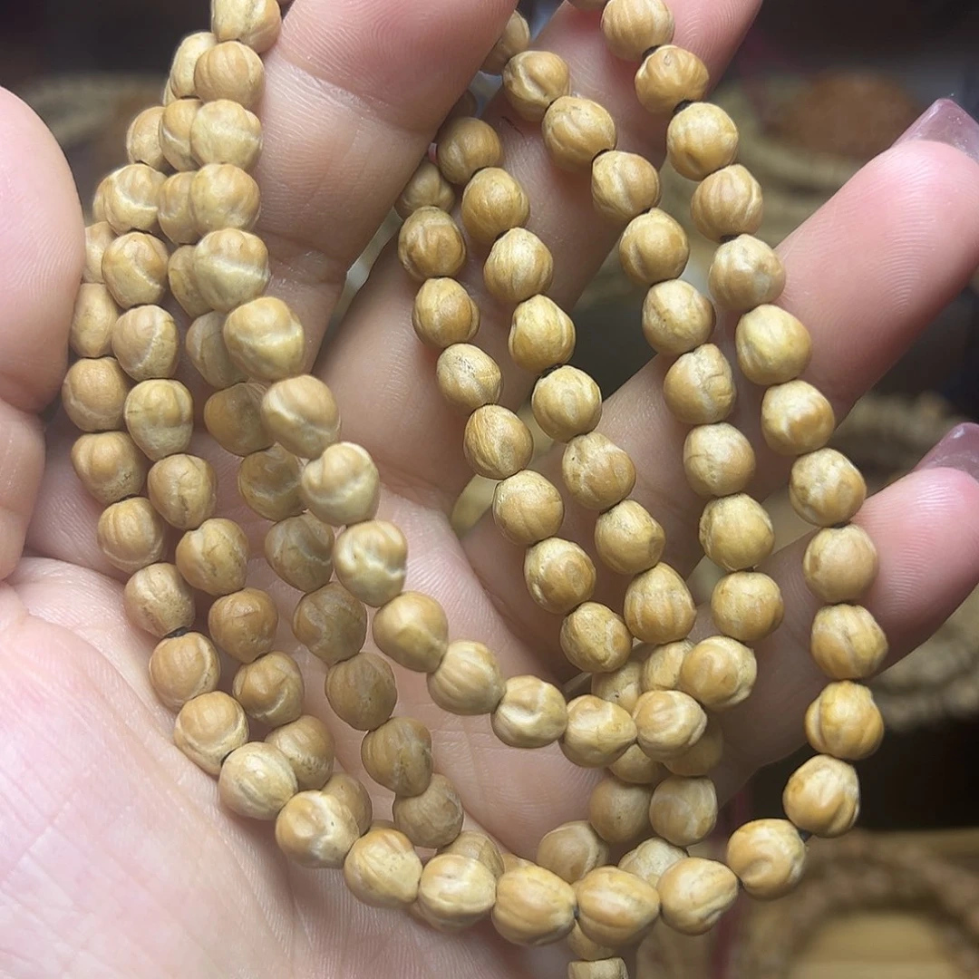 柏香籽/百香籽吊坠原桩竖打三花（夹痕微瑕）介意慎拍