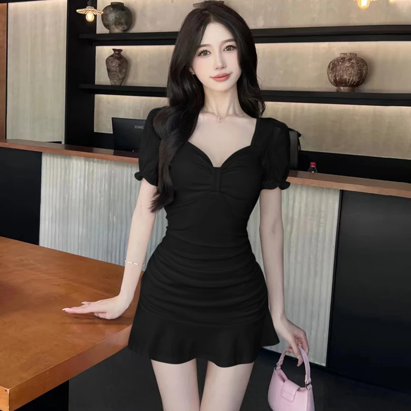 纯欲风性感露锁骨泡泡袖连衣裙夏季新款收腰显瘦荷叶边包臀短裙子