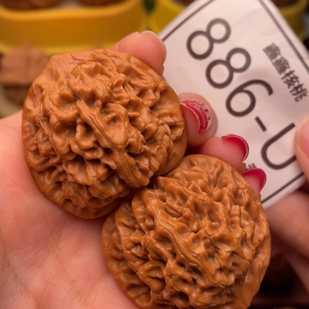 桃核把件秦闷38……