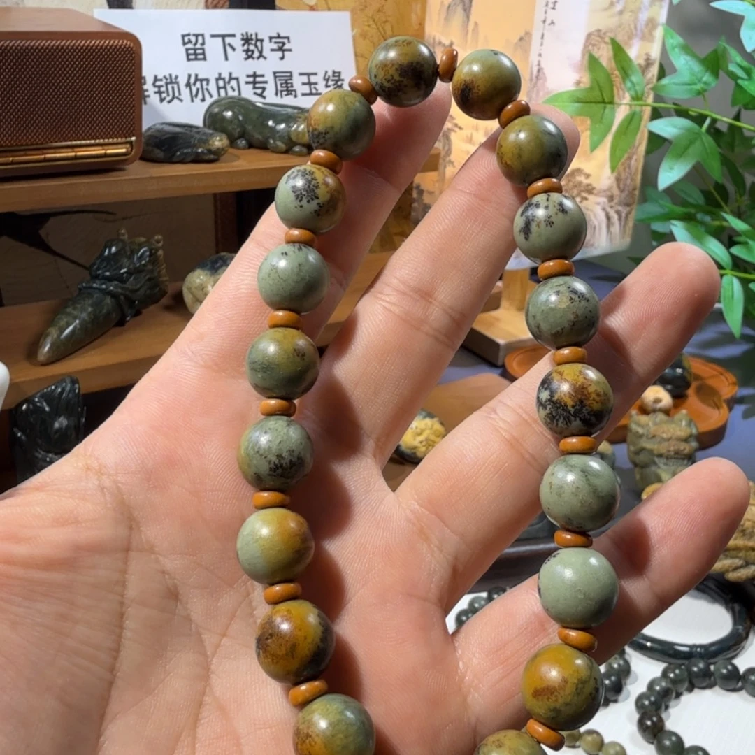红***的未镶嵌透闪石-蛇纹石玉手链