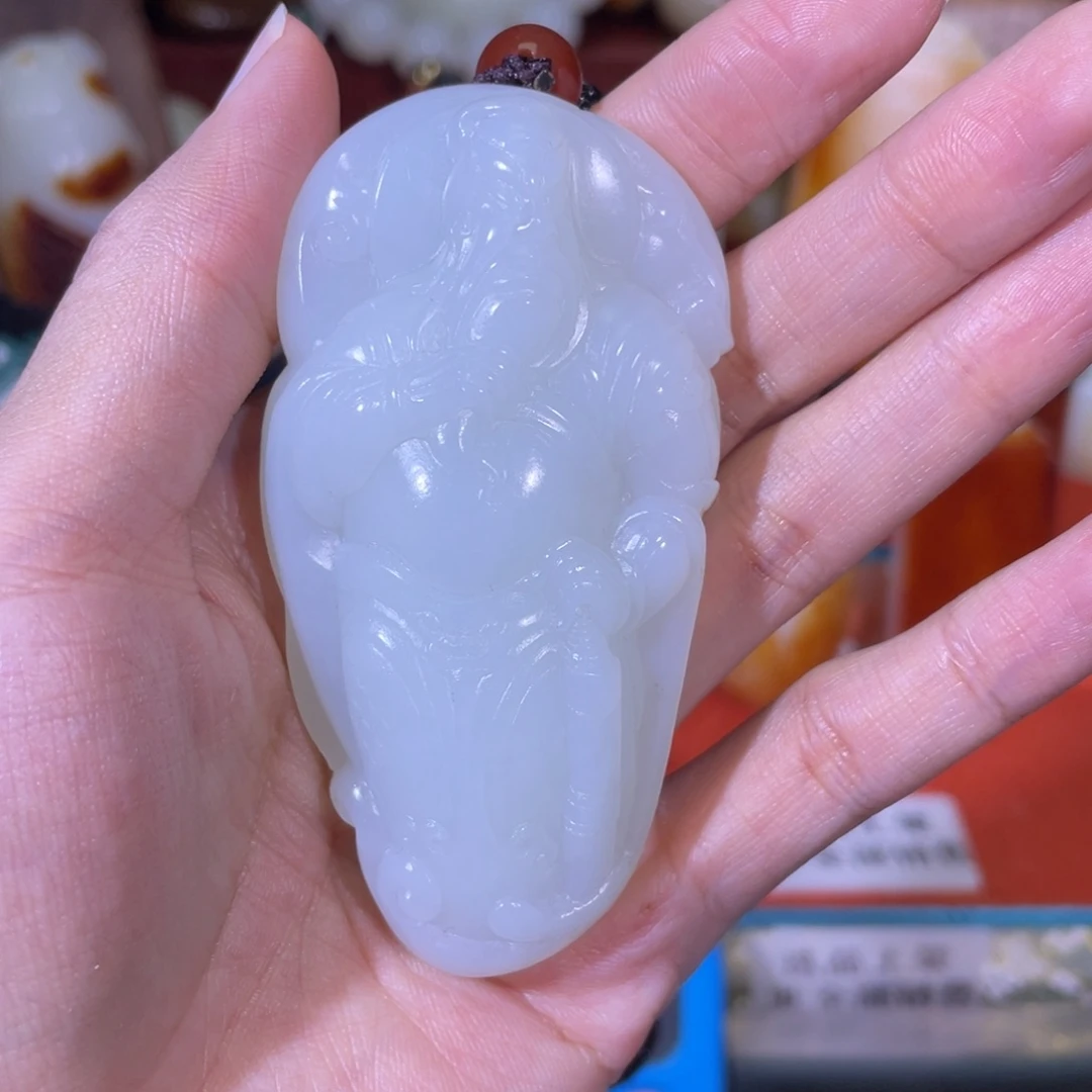 旭***。和田玉未镶嵌把件