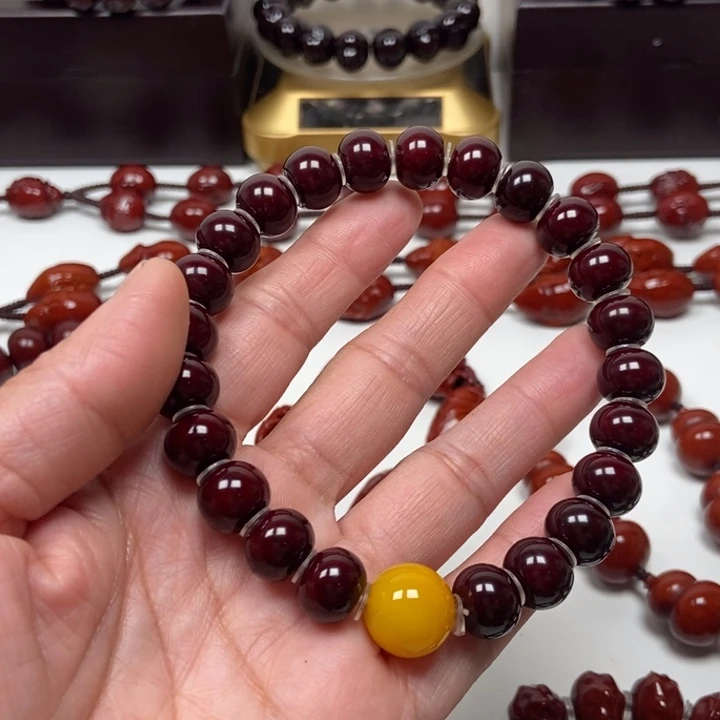 八***央吊坠橄榄核猴头手串