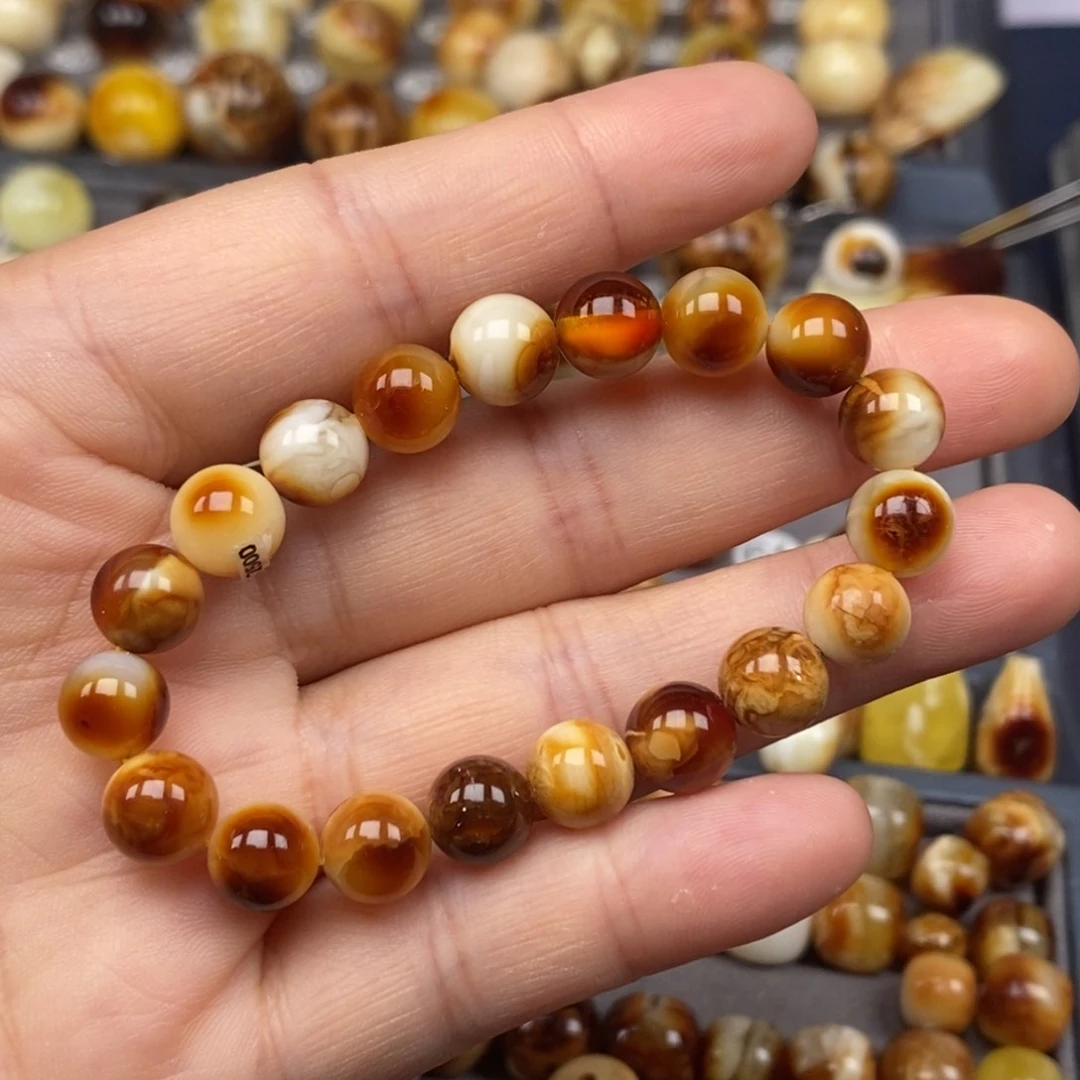 裸石金珀未镶嵌圆珠单圈